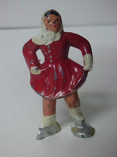 Old Cast Metal Christmas Garden RED w WHITE SKATER  