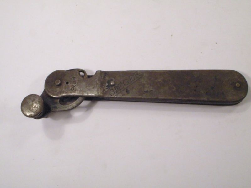 VINTAGE ANTIQUE SIEGER MARKED CAN OPENER SEE  